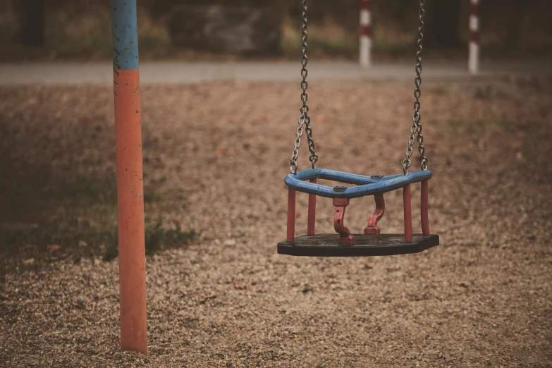 children's swings set with swings hanging from them