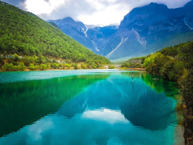 the sky is reflected in the beautiful water