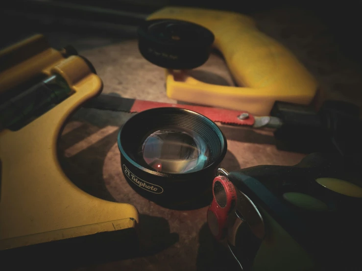 a yellow and black object on a brown table