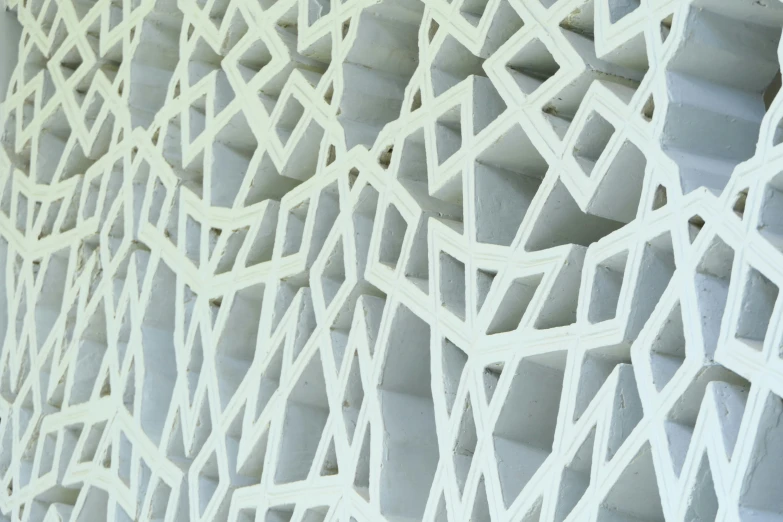 close up view of a building made out of white plastic blocks