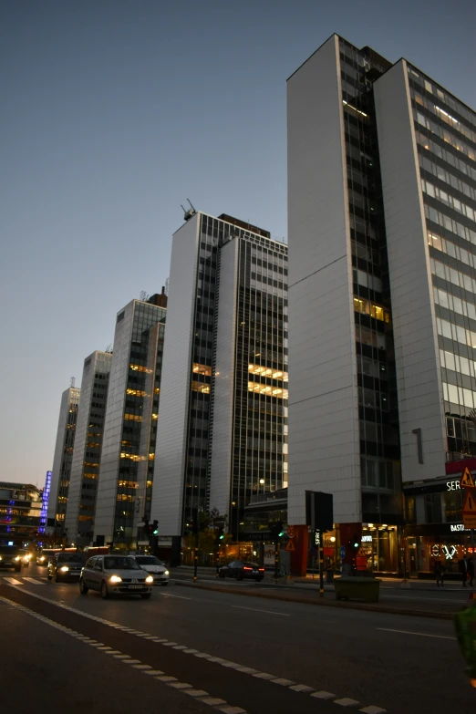 two high rise buildings sit in the distance