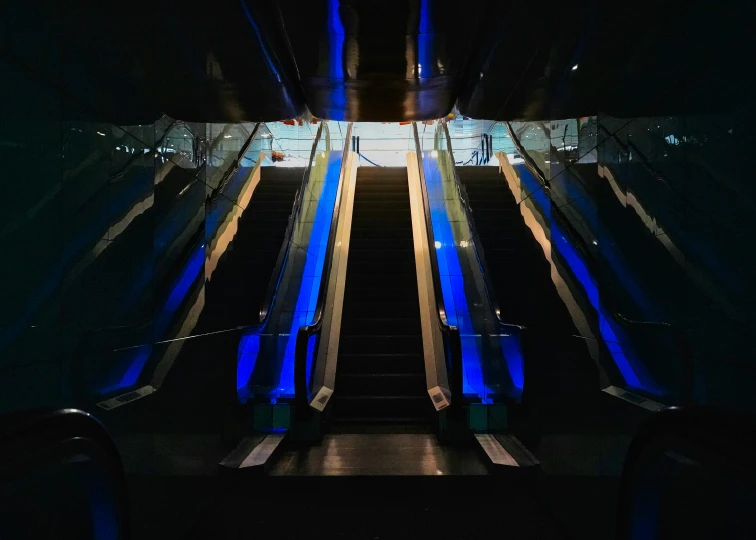 the stairs are painted with blue lights