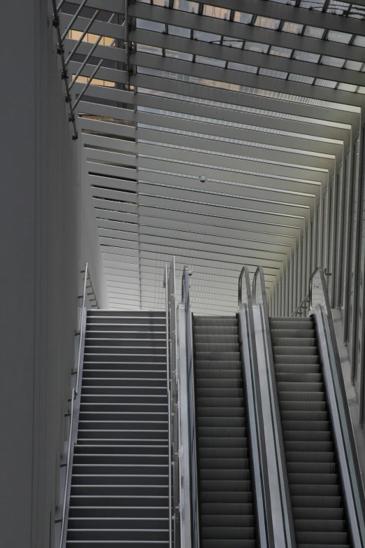 a picture taken from below of an escalator