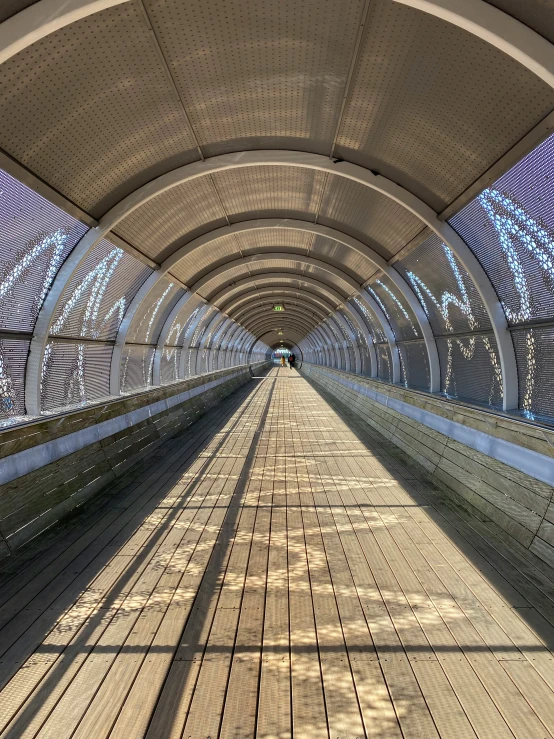 there is a long walkway over some water