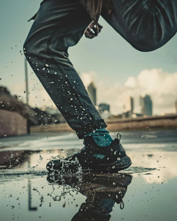 a person stepping on a dle with their legs crossed