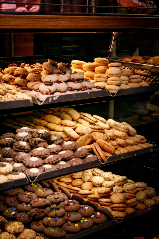 several trays of different kinds and sizes of pastries