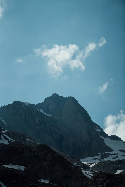 a mountain is shown with some snow on it