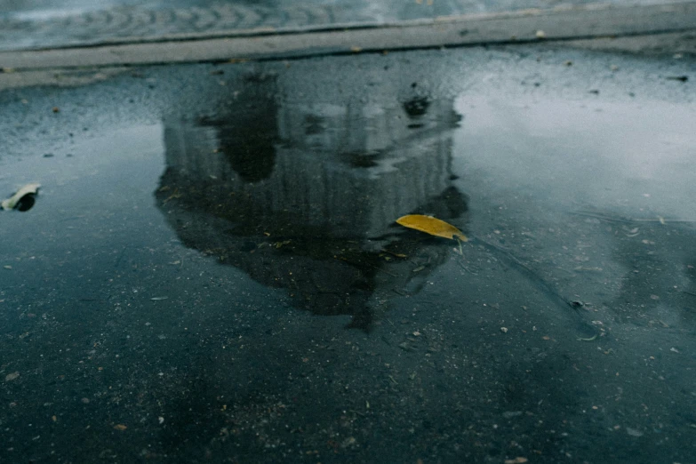 the reflection of a building in the water