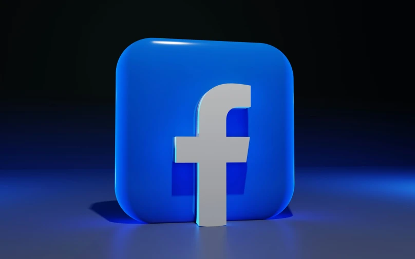 a blue, glowing, rectangular, facebook on