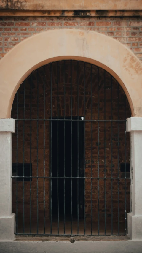 barred gated off into the side walk to a building