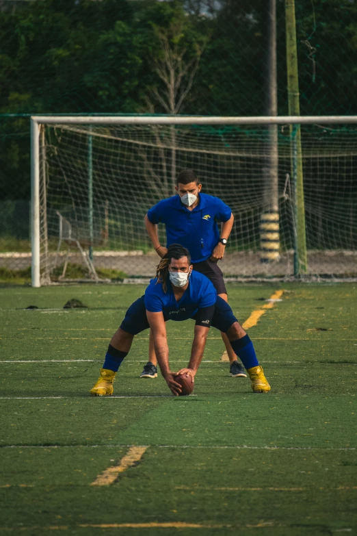 a group of people that are playing soccer