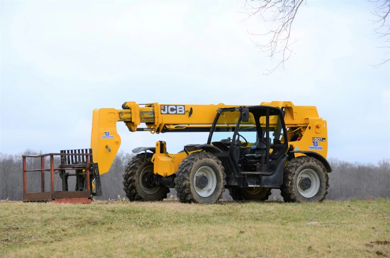 a big yellow truck driving down the road