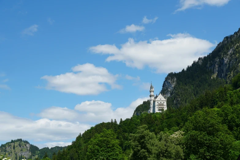 a view of an old building in the mountains