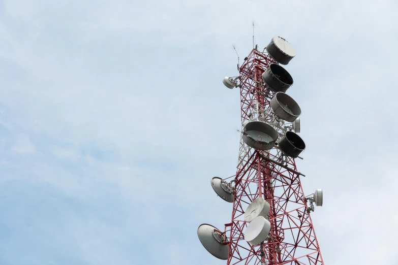 a tower made of a bunch of white dishes