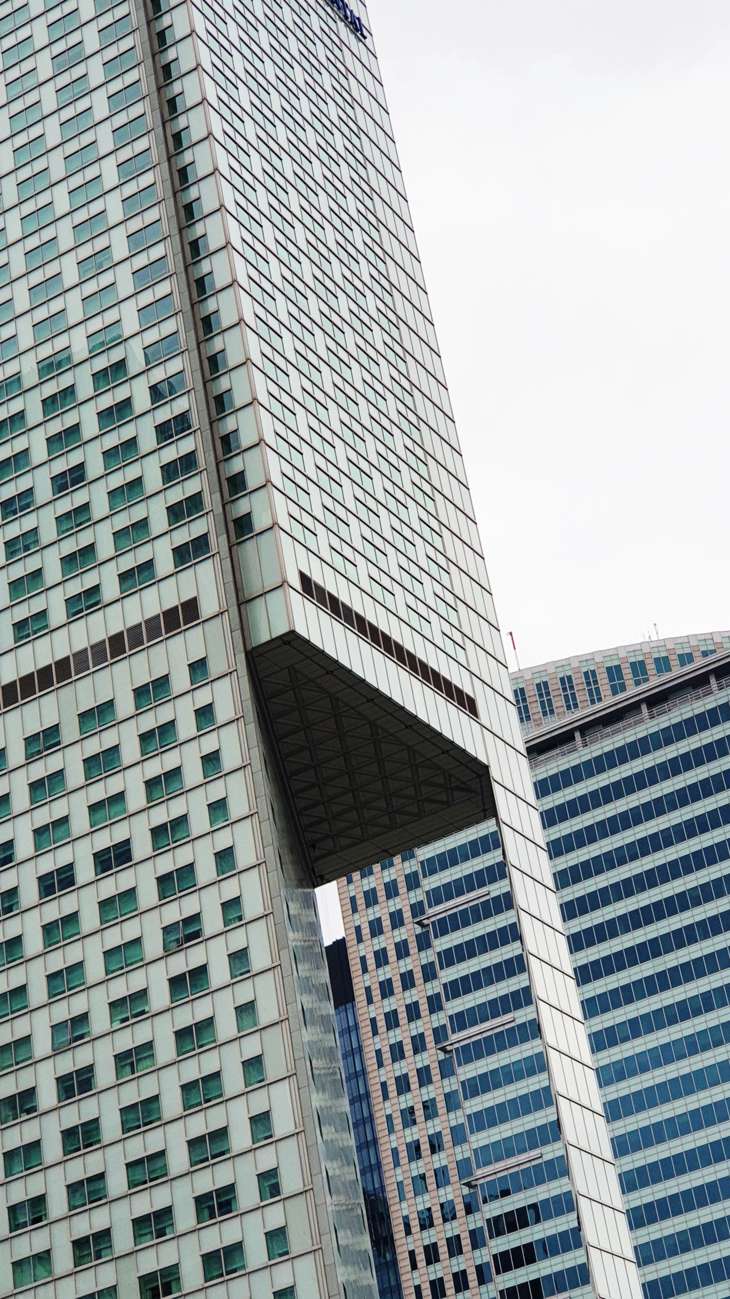 buildings in a business district with one building that is very tall