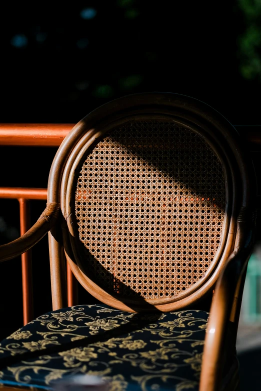 a close up of the back of a brown chair