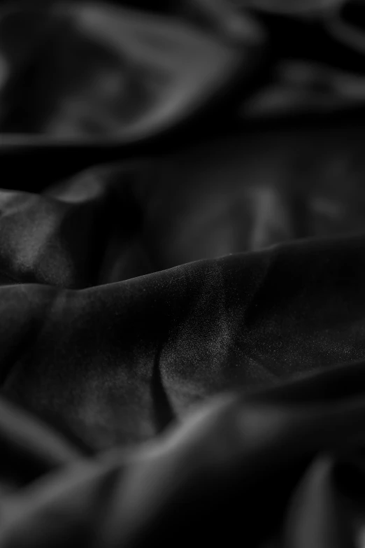 black and white pograph of a bed spread