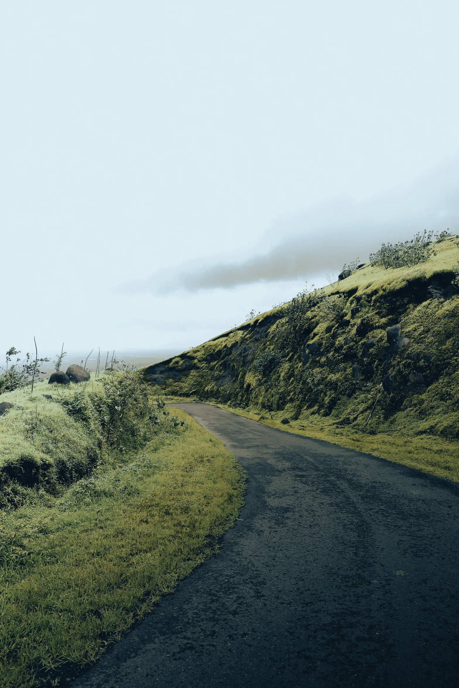 a road on the side of a hill