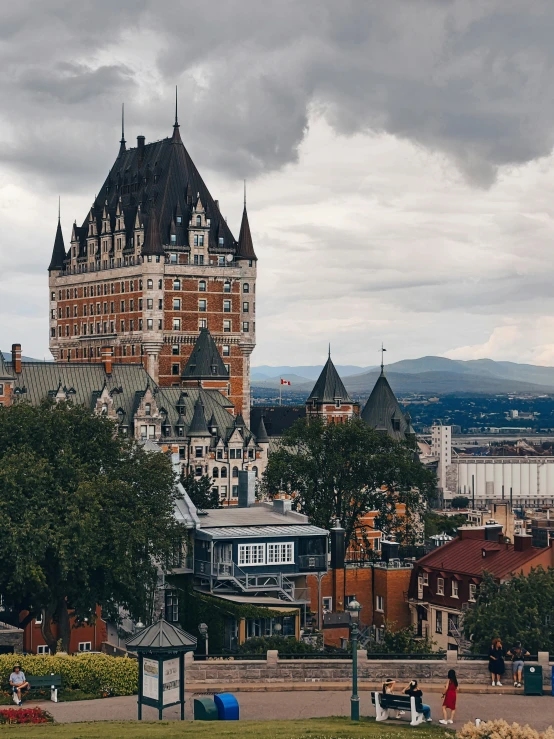 a large building has a spire on it