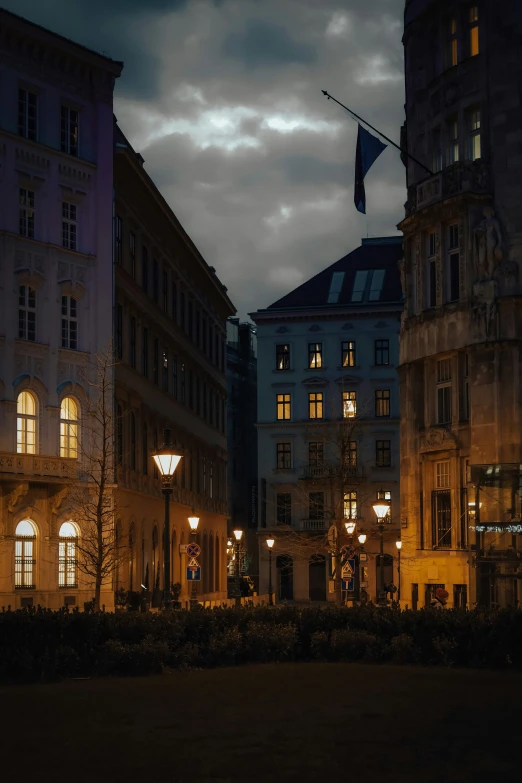 many lights are on at night time as a dark storm moves in