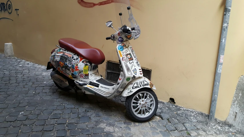 an electric moped is covered with several things