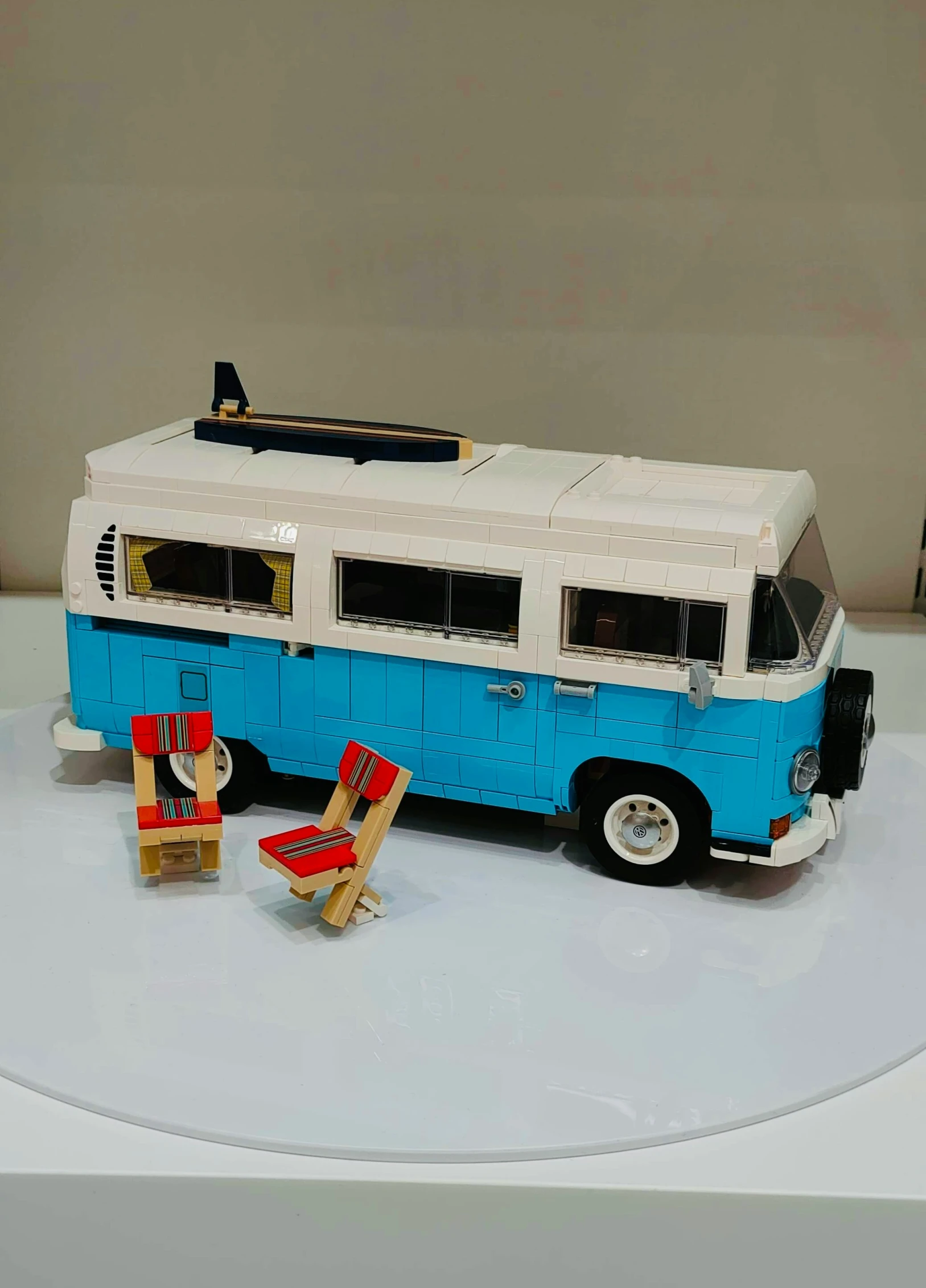 a toy bus sitting on top of a table