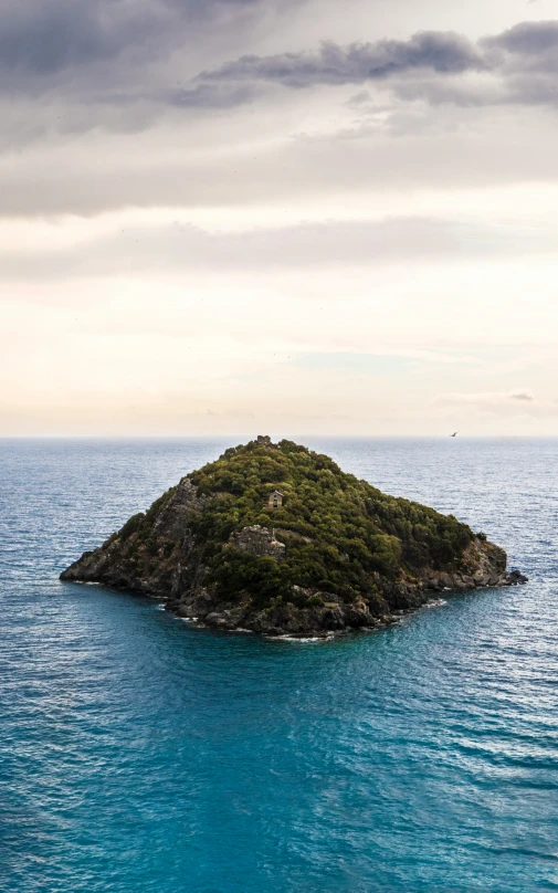 an island that is floating in the middle of the water