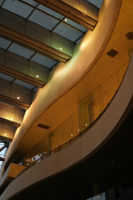 a building with a large curved roof on it