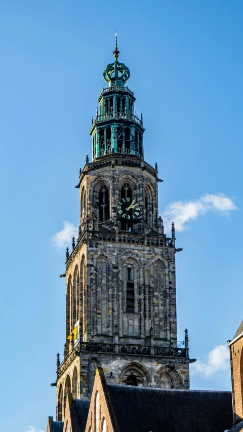 a large clock tower on top of an old building