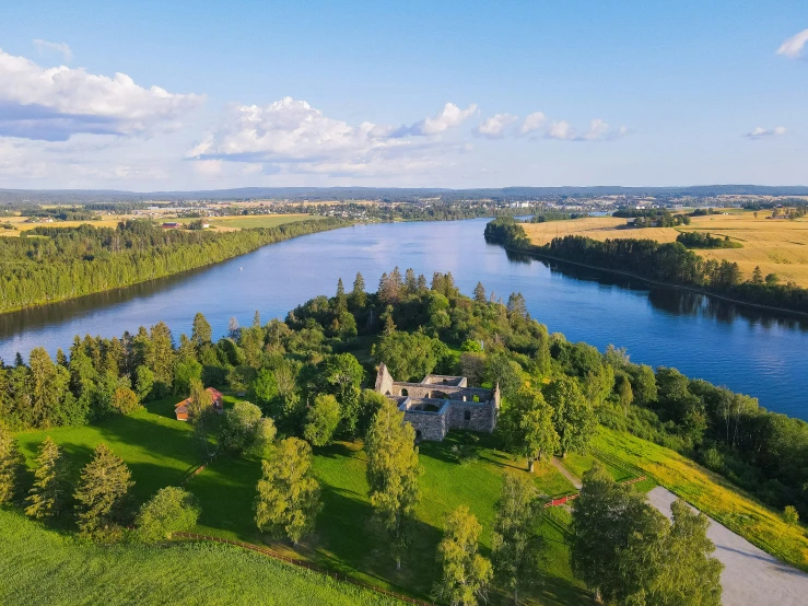 a large body of water surrounded by trees