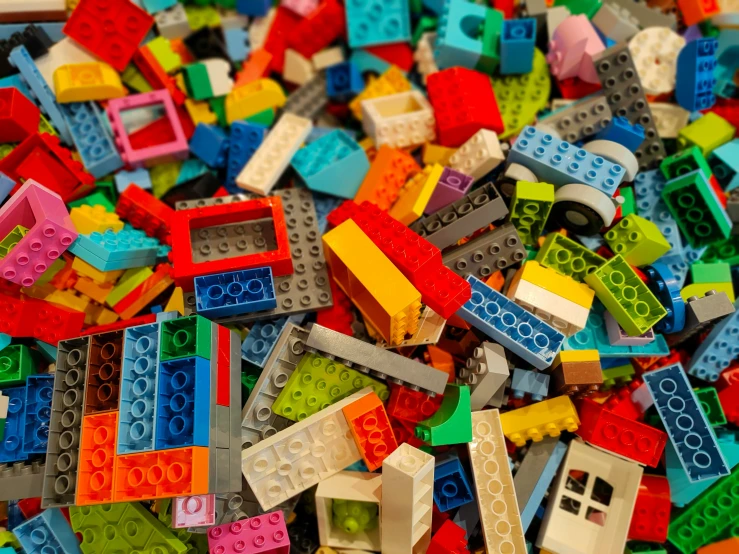 a very big pile of colorful lego pieces