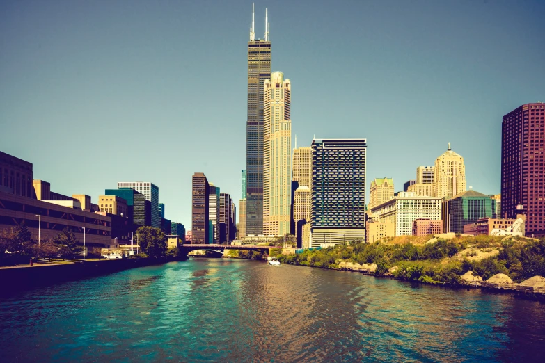 a large city next to a river and water