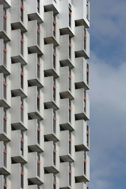 some windows on the side of an apartment building