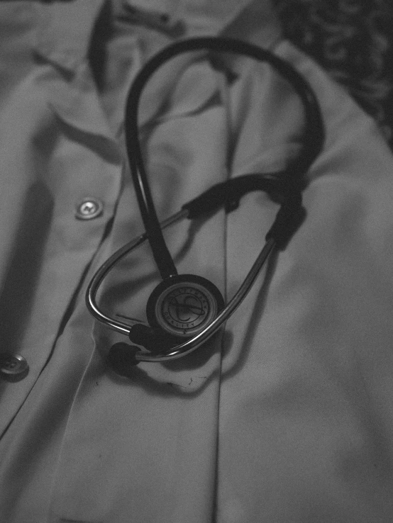 a stethoscope laying on top of some fabric