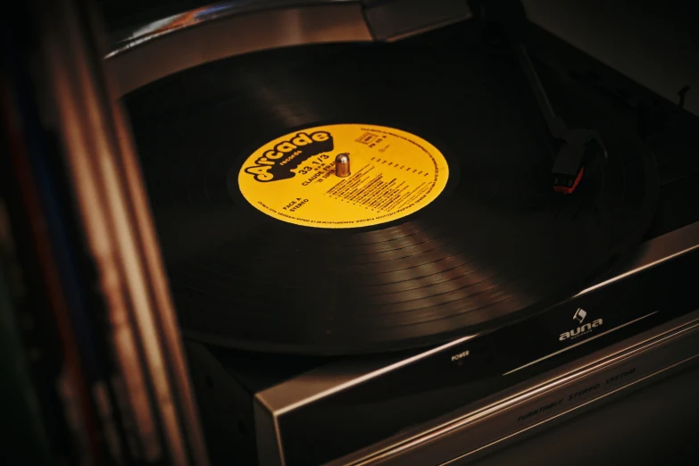 an old record player with its records on a stereo