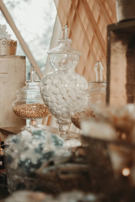 lots of different glass objects on a table