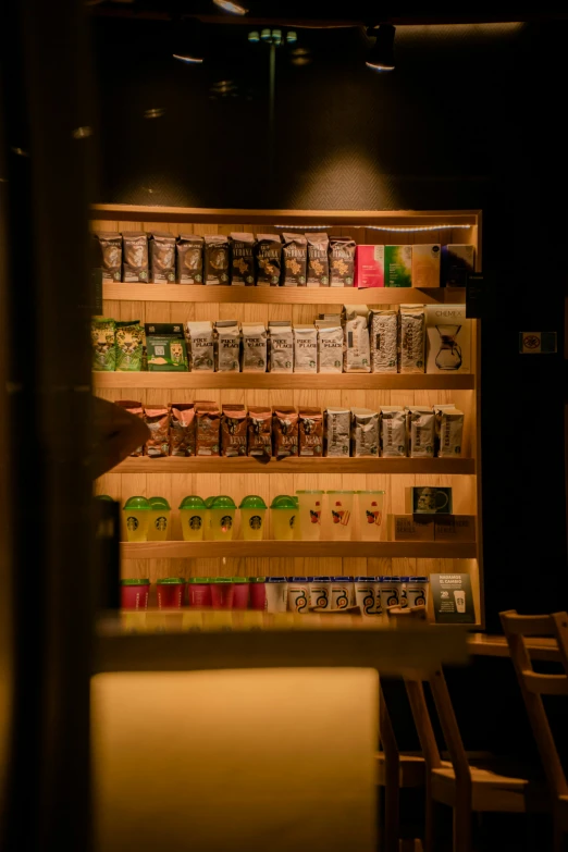 a store with rows of shelves filled with lots of items