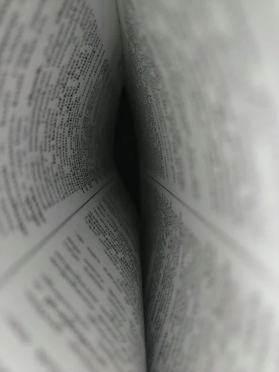 an opened book with several lines and shapes