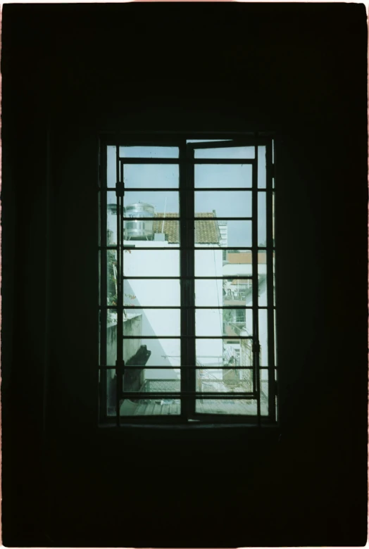 a view out a window onto some buildings