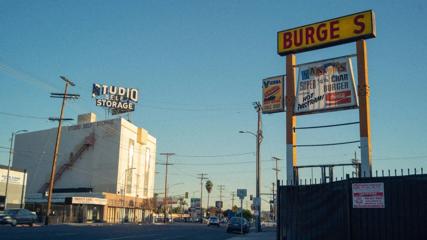 the burger store's signage for the building is yellow