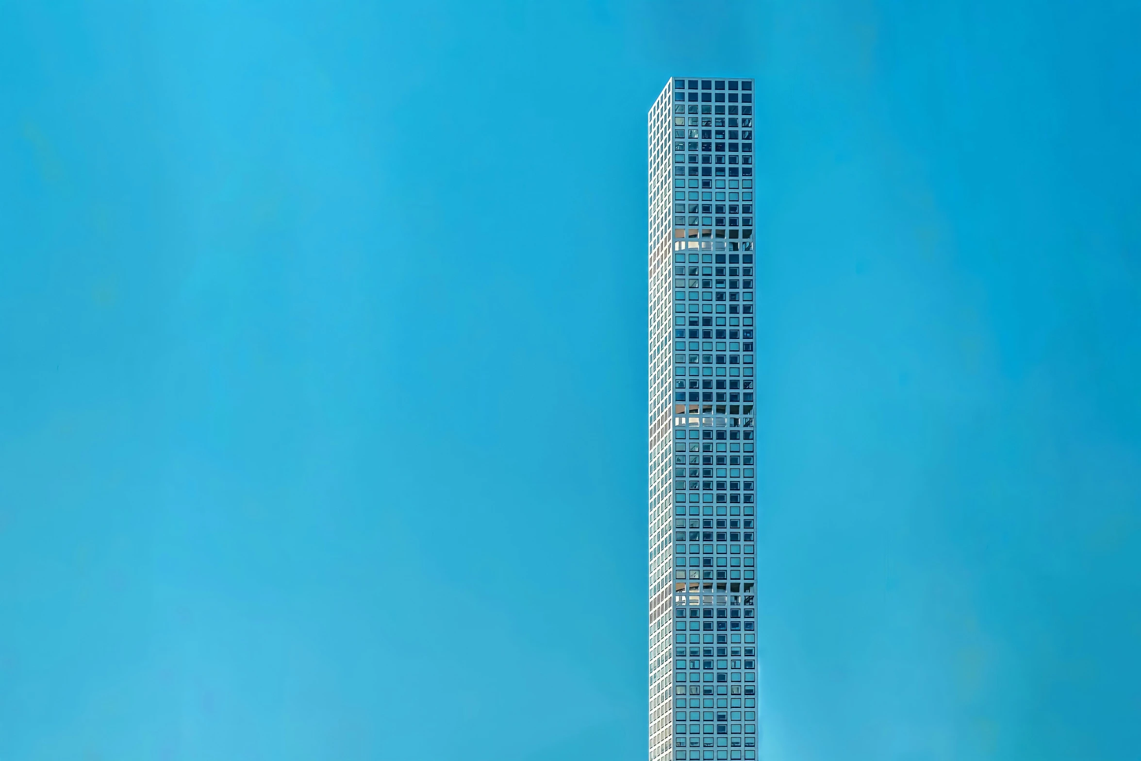 the very tall building has multiple levels on it