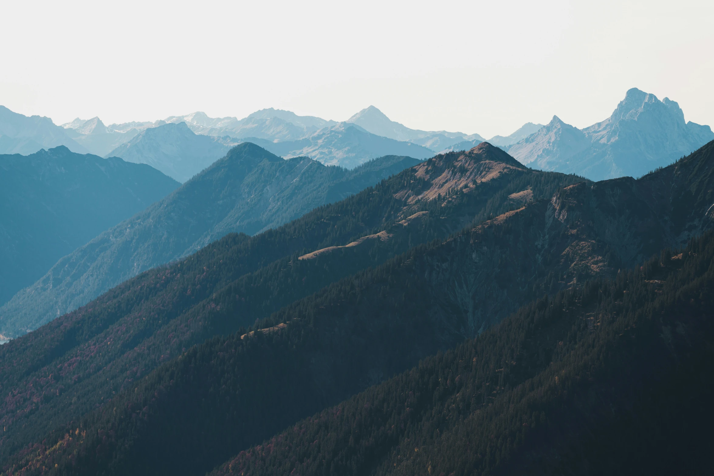 the view from a high altitude plane of mountains