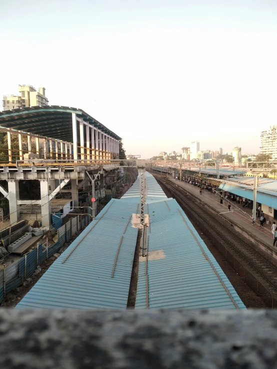 looking down the tracks of a train platform