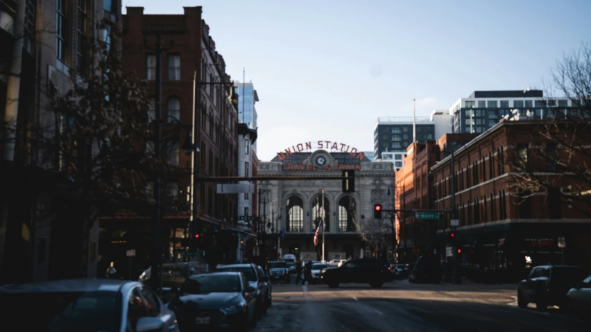 a street with some buildings and cars on it