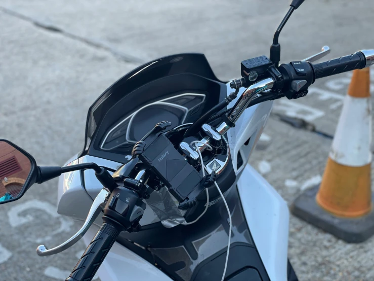 closeup of the handle bars on a motorbike