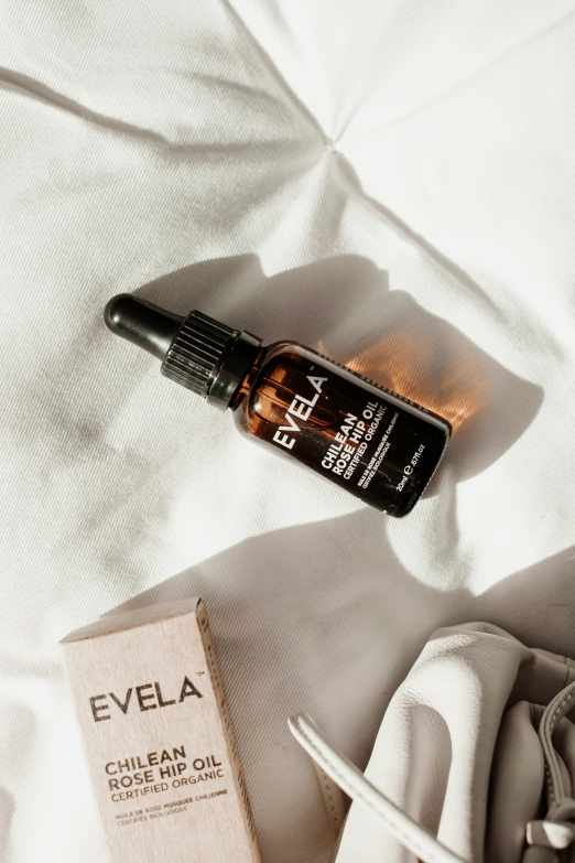 a bottle of esea skin care on a white sheet