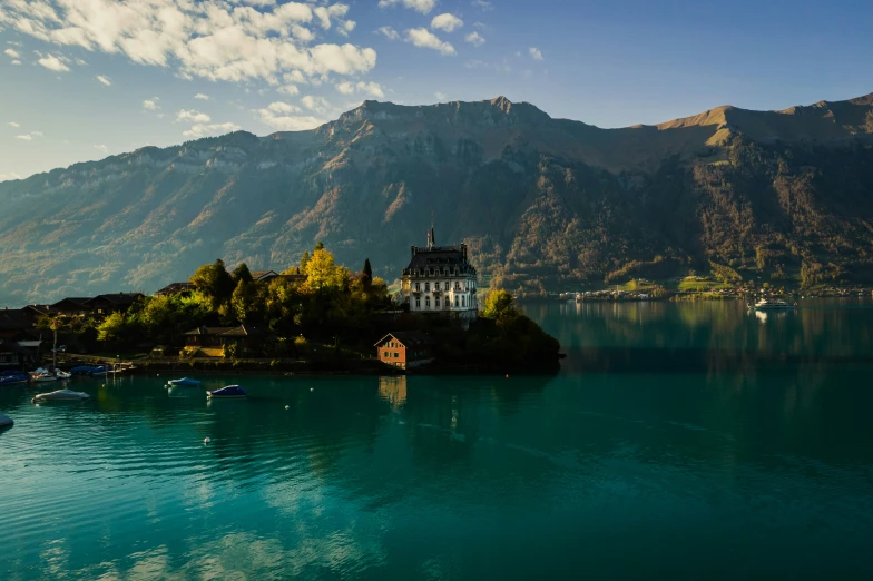 a small island with a house on it's side