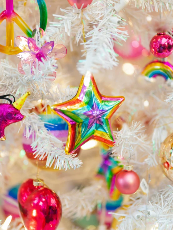 ornaments are hanging from the bottom of the tree