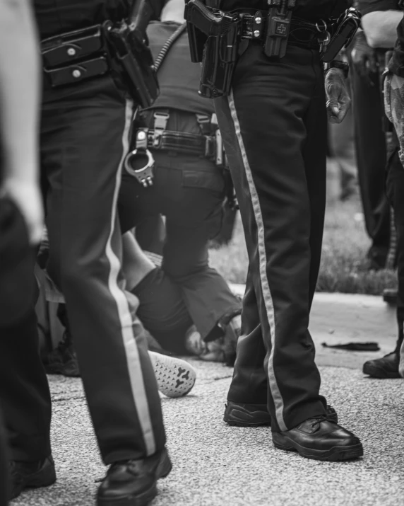 a cop standing next to his officer in uniform