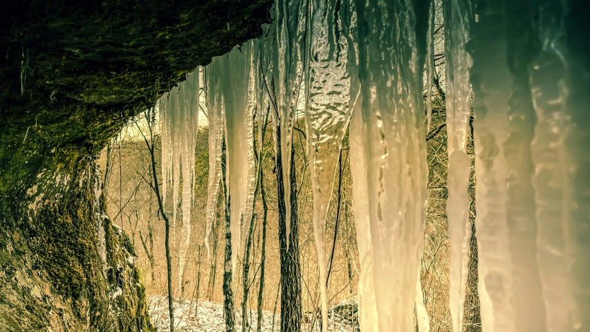 two people walking away in the distance through ice